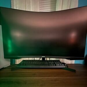 Samsung Curved Display with Black Keyboard